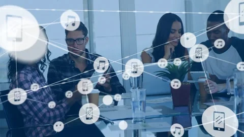 Collaborating team in business casual sharing screens at glass table in office Stock Footage 333902363