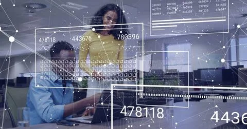 Collaborating technology experts examining network data overlays on laptop in Foto stock