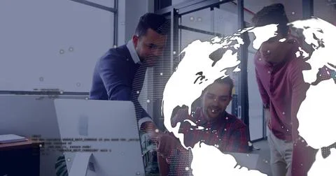 Collaborating three colleagues coding on desktop screen and laptop in office, 스톡 사진