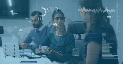 Collaborating, three colleagues examining data overlays in conference room, with Stock Photos
