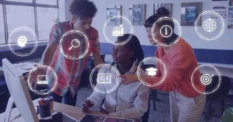 Collaborating three coworkers analyzing data on computer in office workspace, Fotos de archivo