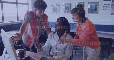 Collaborating three software engineers typing code on monitor in modern Foto stock