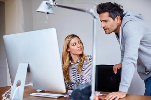 Collaboration, computer and creative people in office for project management Stock Photos