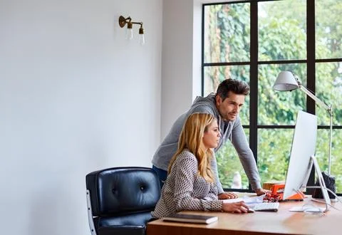 Collaboration, computer and creative team in office for project management Stock Photos