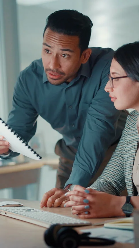 Collaboration, computer and documents with business people in office together Stock Footage 310658460