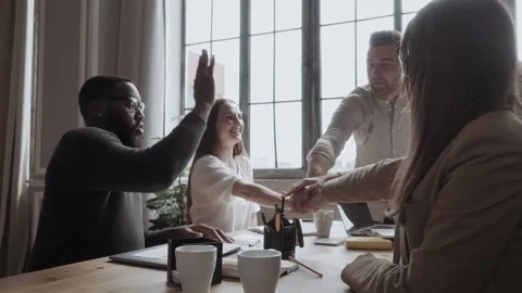 Collaboration Connection Team Brainstorming Unity. workers putting hands Stock Footage 132519138