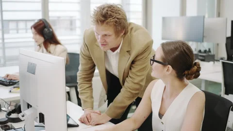 Collaboration in the contemporary office elevates business efficiency and Stock Footage 280629462