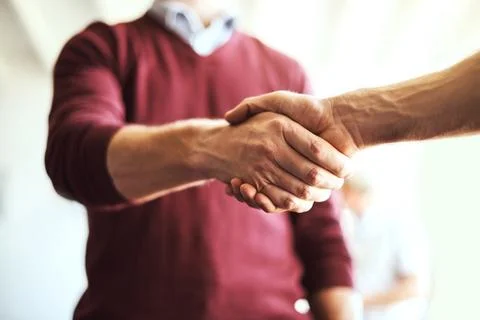 Collaboration is the first step to success. two unrecognizable businessmen Stock Photos
