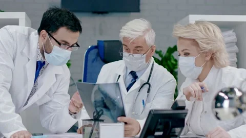 Collaboration of a team of doctors. X-ray examination. Training of young Stock Footage 151331532