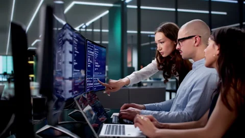 Collaborative Coding Session In Busy Office Stock Footage 326057663