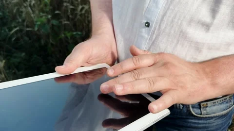 Collaborative digital farming, Mobile networks empowering farmers, Tracking crop Stock Footage 316178521