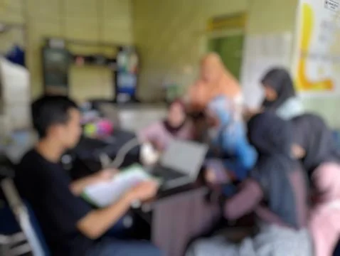 Collaborative environment depicted in a soft focus, showcasing teamwork and.. Stock Photos