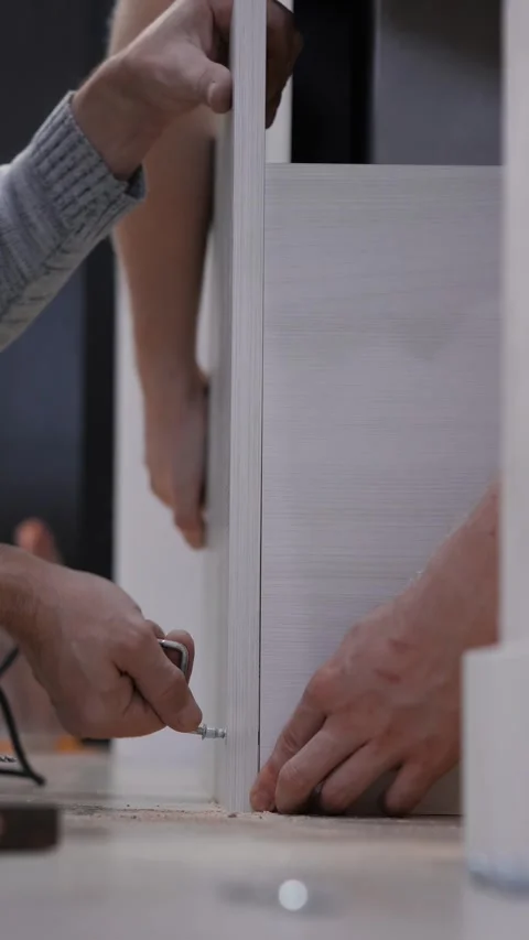 Collaborative Furniture Assembly Stock Footage 303385157