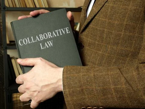 Collaborative law is in the hands of a lawyer in a jacket. Stock Photos