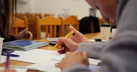 Collaborative learning fosters inspiration among participants, with shared Stock Footage 296326246