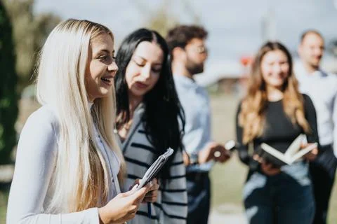 Collaborative Learning Outdoors. Students Achieving Better Results Through Stock Photos