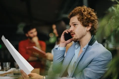 Collaborative Planning: Architects, Engineers, and Executives Discussing Stock Photos