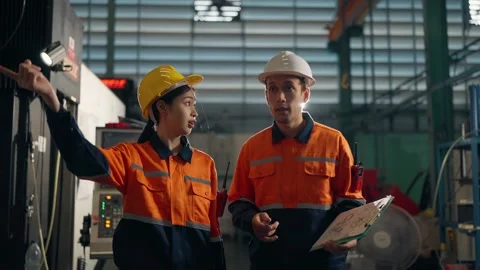 Collaborative Precision in Industrial Setting Stock Footage 332201414