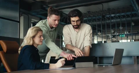 Collaborative Problem-Solving in Office: Brunette Guys, Blonde Woman, Tablet Stock Footage 242404635