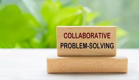 Collaborative Problem Solving text on wooden block with blurred nature back.. Stock Photos