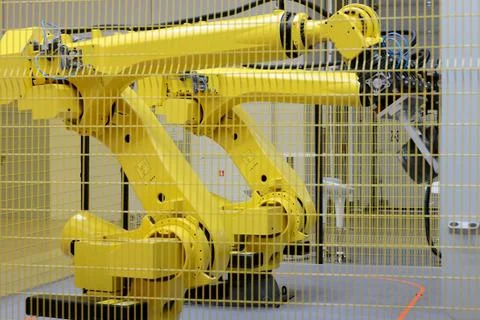 Collaborative robotic work cell with two robots Stock Photos