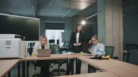 Collaborative team in modern office working on documents with slow motion Video stock 312256832