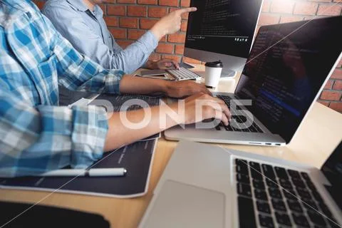 Collaborative work Software engineers website developer technologies or progr Stock Photos