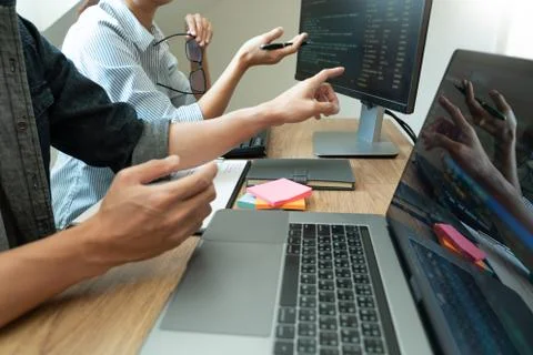 Collaborative work Software engineers website developer technologies or progr Stock Photos