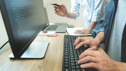 Collaborative work Software engineers website developer technologies or progr Stock Photos