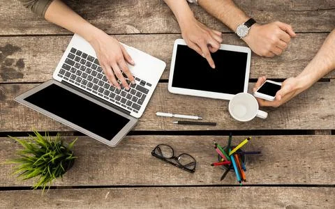 Collaborative workspace with technology and coffee during a brainstorming Stock Photos