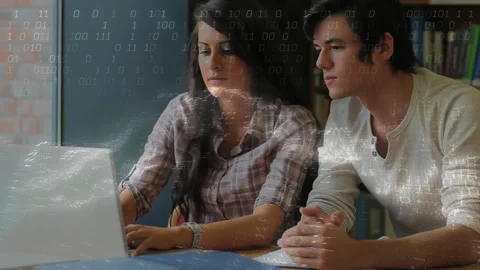 Collaborators typing on laptop and spawning binary streams across study desk Video stock 312281215