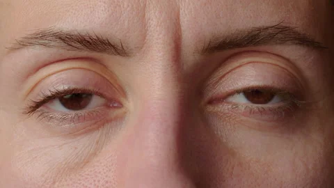 Collage of close-up of eyes and faces of people of different ages and genders Stock Footage 229950082