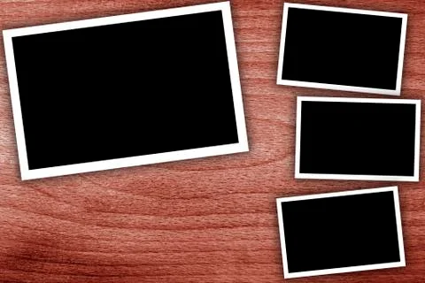 Collage, empty frames on the wooden background Stock Photos