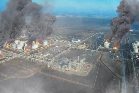 Collage. Fire at refinery. Flames and smoke of fire. Stock Photos