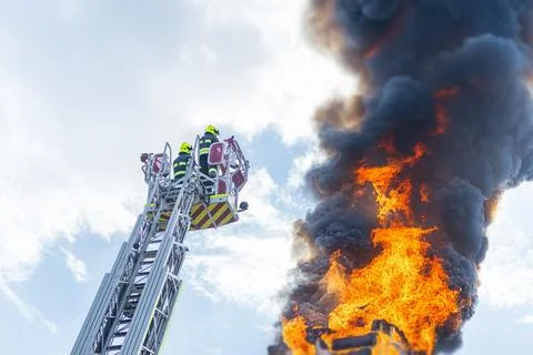 Collage image of a daytime fire operation outdoor, red ladder truck and a clo Stock Photos
