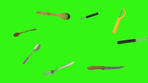 Collage of kitchen utensils falling against a vibrant green background Vidéo 337346401