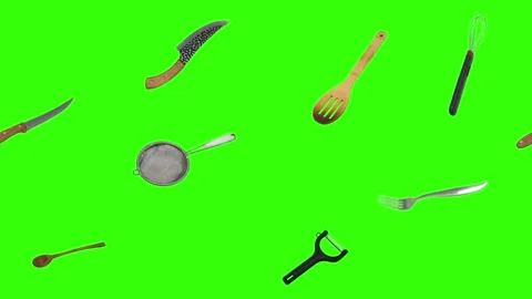 Collage of kitchen utensils falling against a vibrant green background Stock Footage 338318520