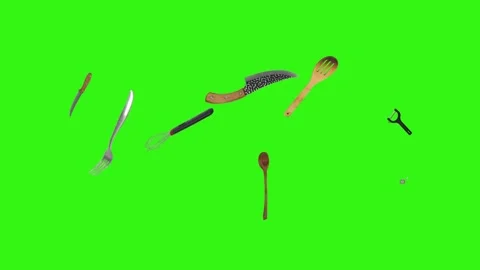 Collage of kitchen utensils falling against a vibrant green background Stock Footage 338318531