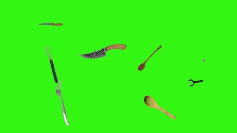 Collage of kitchen utensils falling against a vibrant green background Stock Footage 338318533