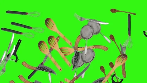 Collage of kitchen utensils falling against a vibrant green background Stock Footage 338318561