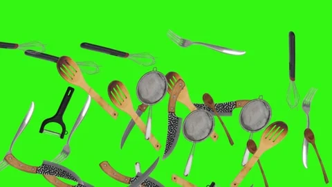 Collage of kitchen utensils falling against a vibrant green background Stock Footage 338318564