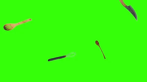 Collage of kitchen utensils falling against a vibrant green background Stock Footage 338318568