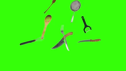 Collage of kitchen utensils falling against a vibrant green background Stock Footage 338318570