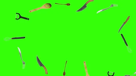 Collage of kitchen utensils falling against a vibrant green background Stock Footage 338318577