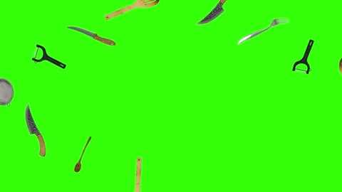 Collage of kitchen utensils falling against a vibrant green background Stock Footage 338318579