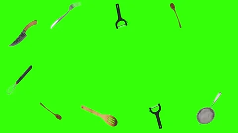 Collage of kitchen utensils falling against a vibrant green background Stock Footage 338318581