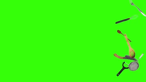 Collage of kitchen utensils falling against a vibrant green background Stock Footage 338318585