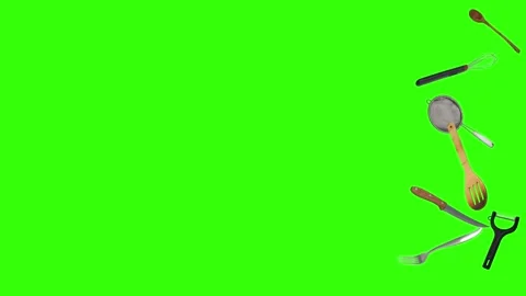 Collage of kitchen utensils falling against a vibrant green background Stock Footage 338318586
