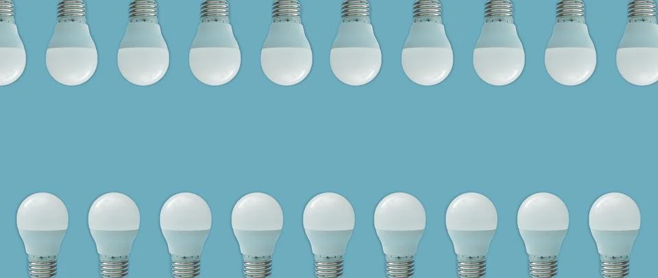 A collage of light bulbs on a blue background Stock Photos