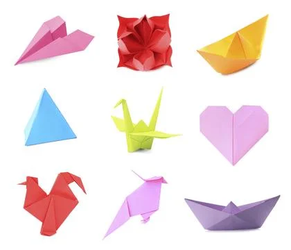 Collage with many different paper figures on white background. Origami art 库存照片